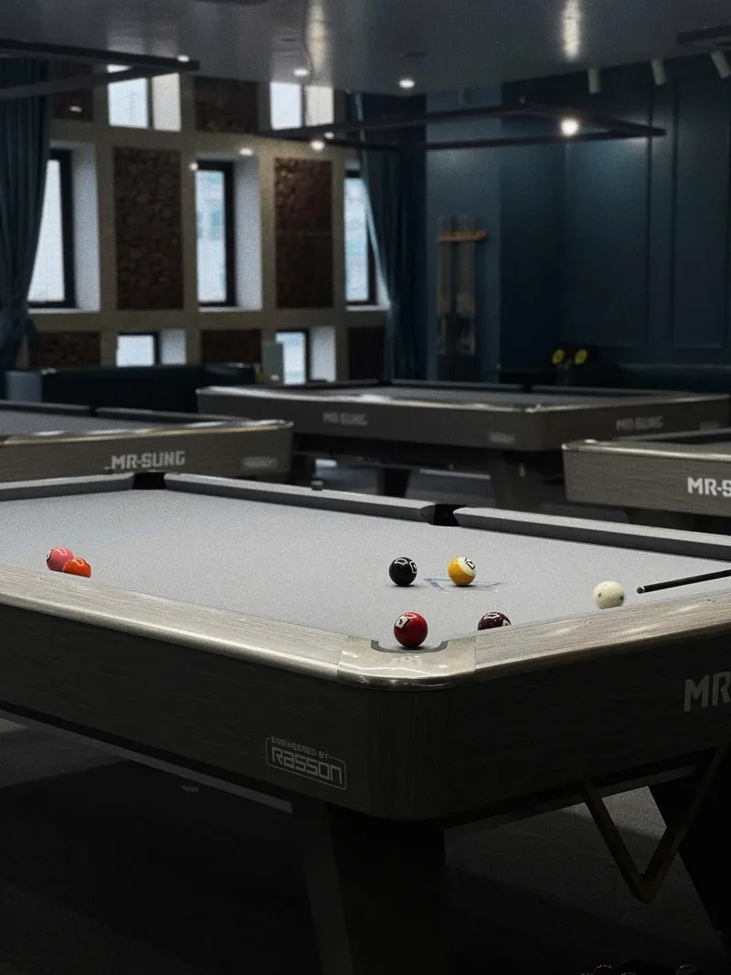 Modern table system in a refined space at New H2 Billiards CLUB 