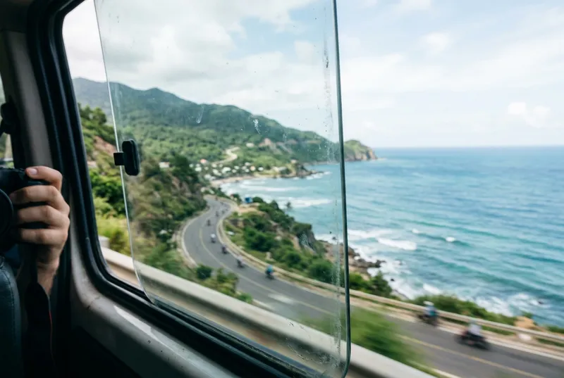 Shooting through the window of a moving vehicle